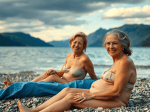 deux-femmes-nues-sur-une-plage-de-gravier-au-bord